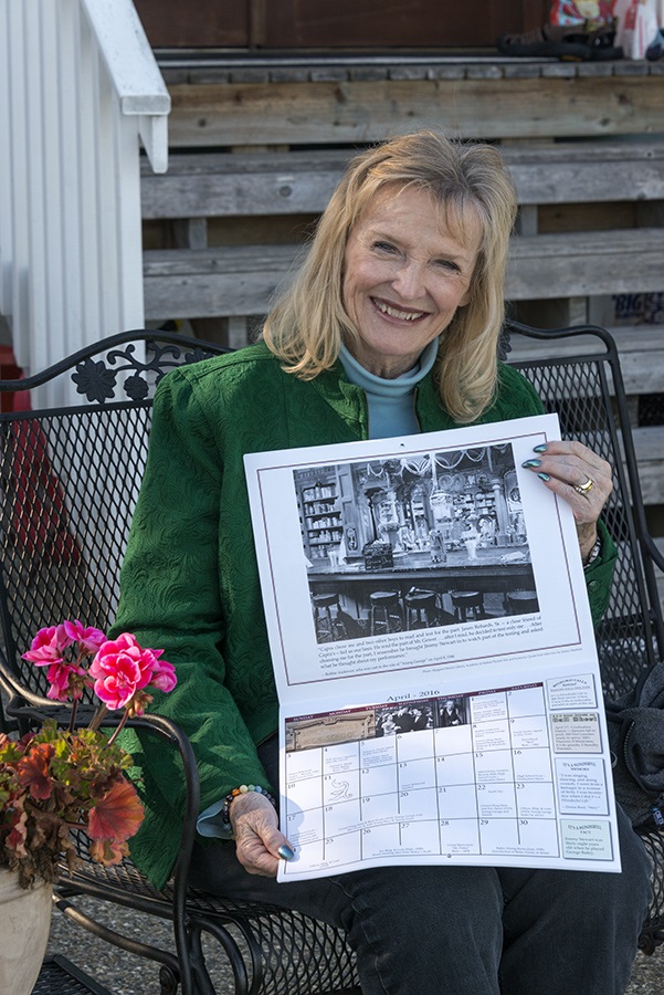 Karolyn “Zuzu” Grimes displays different pages from the calendar.
April 2016