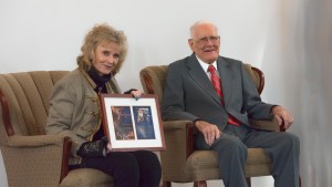 Karolyn Grimes presents the 14th Annual George Bailey award to Reg Batty and his twin brother Andy (who passed away in August, 2017).  Reg passed away less than three weeks after receiving the Award.  Photo by Henry Law