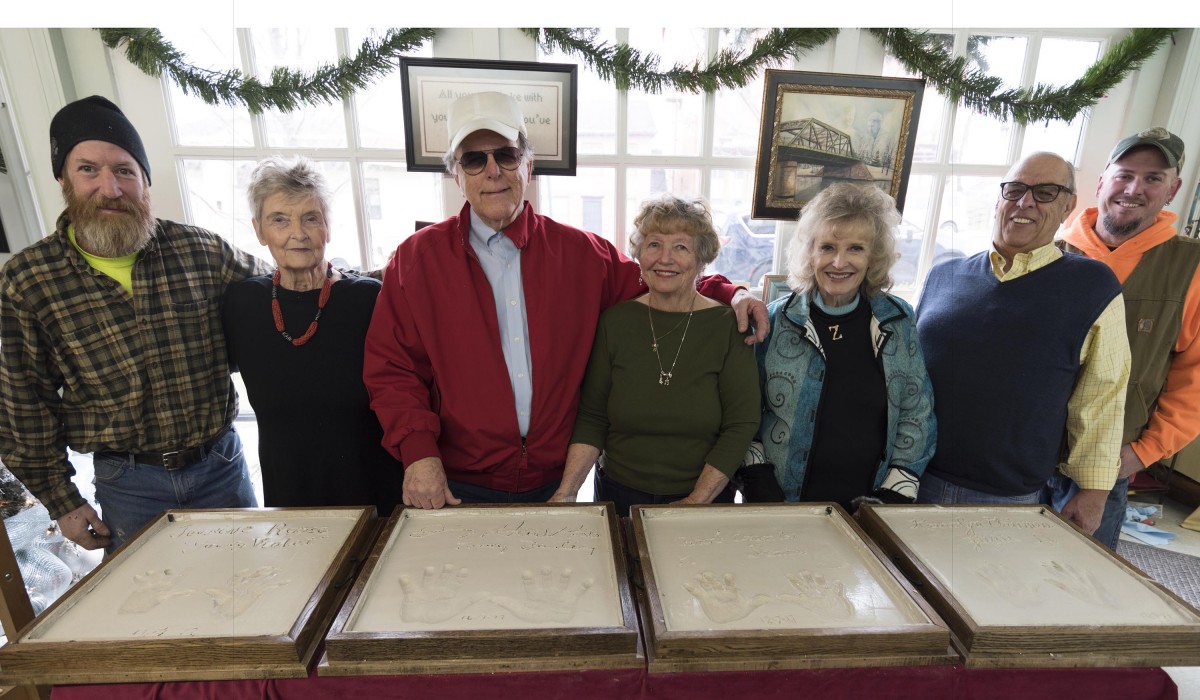 Thanks to Ed Thurston (far right) and Ed Van Fleet (far left) from Thurston Services who provided the cement and beautiful display cases and to Lou Ferrara (second from right) for organizing this lasting tribute to the four actors from "It's a Wonderful Life."  Photo by Henry Law