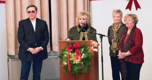 Karolyn Grimes at the podium with (left to right) Jimmy Hawkins, Jeanine Roose and Carol Coombs at "Frank Capra's Preview Dinner" held at the New York Chiropractic College.  Photo by Henry Law