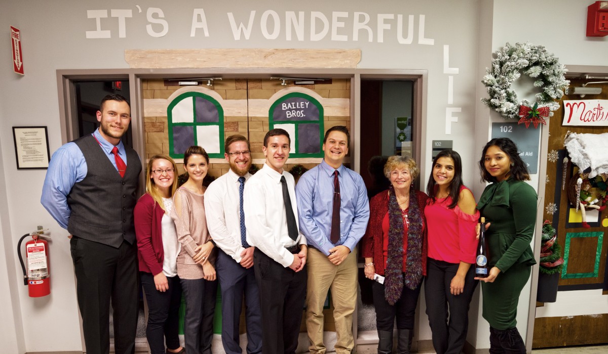 Carol Coombs (Janie Bailey) with students in at the New York Chiropractic College prior to the Preview Dinner on December 8.  Photo by Henry Law